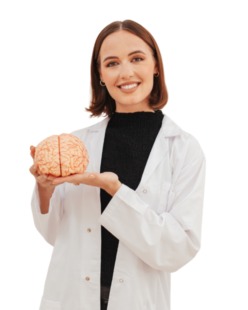 Mia Lovequest in a lab coat, holding an anatomical model of a brain
